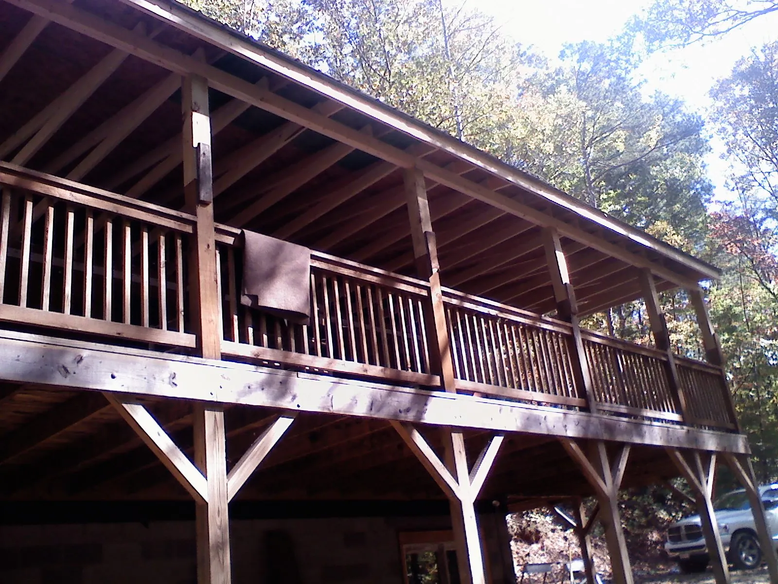 Timber framing under a new elevated porch and deck — Roof Leak Repair in Rocky River by Roofing Brothers